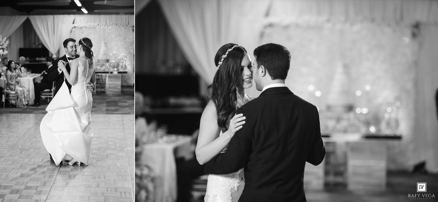 Bride and groom sharing their first dance at a wedding reception in a beautifully decorated venue.