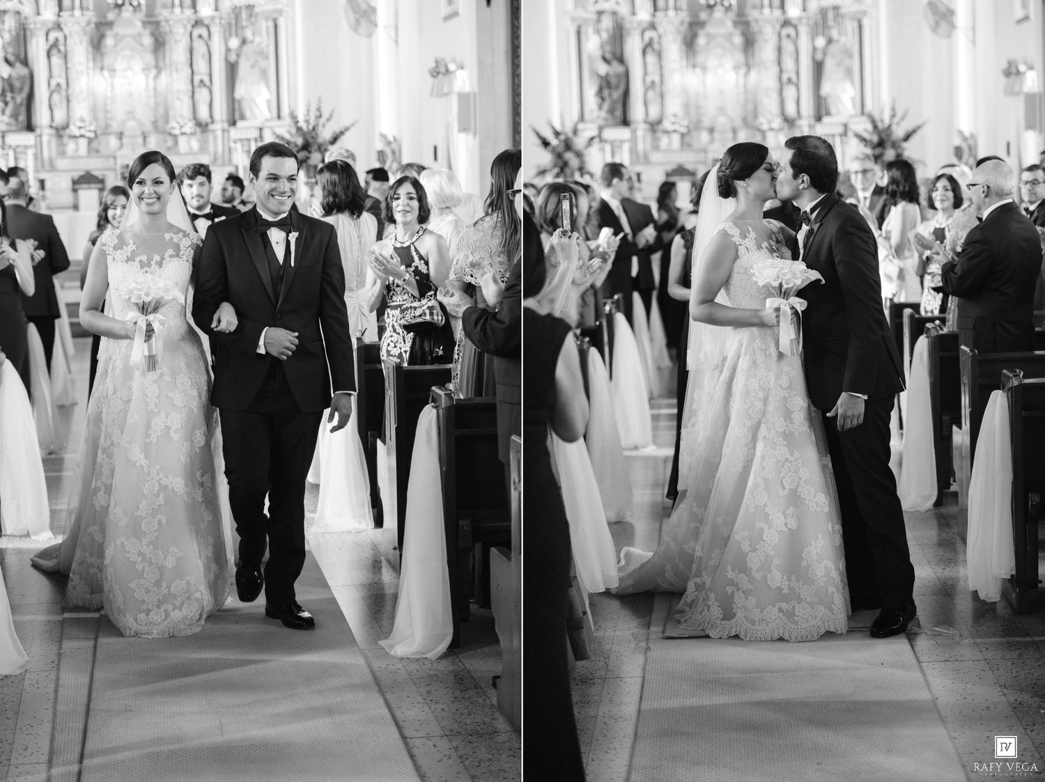 Black and white wedding photo of bride and groom walking down church aisle during elegant ceremony.