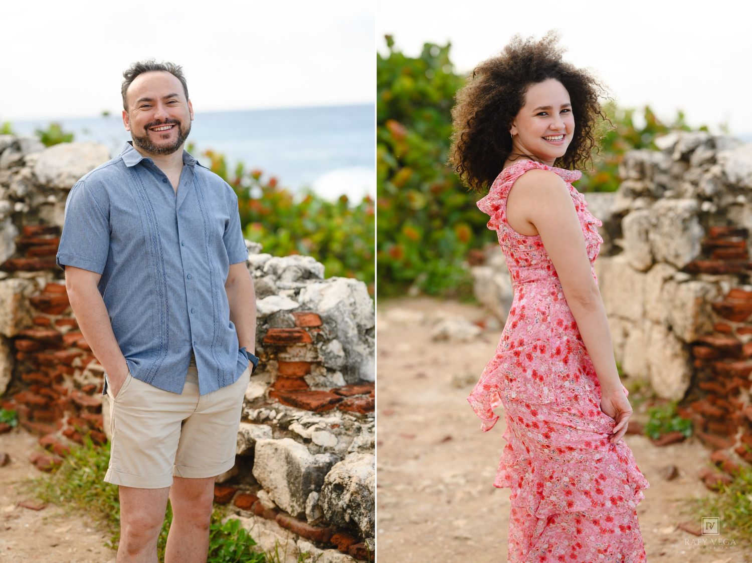 Man in blue shirt and khaki shorts stands by stone ruins, woman in pink floral dress poses on coastal path.
