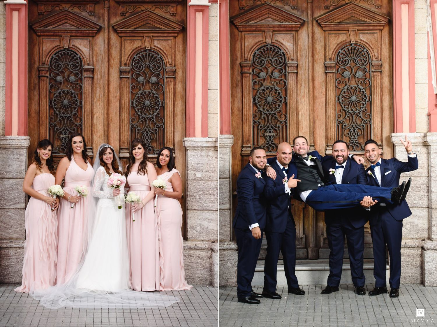 Bridesmaids in pink gowns and groomsmen in navy suits pose with bride and groom outside ornate building.