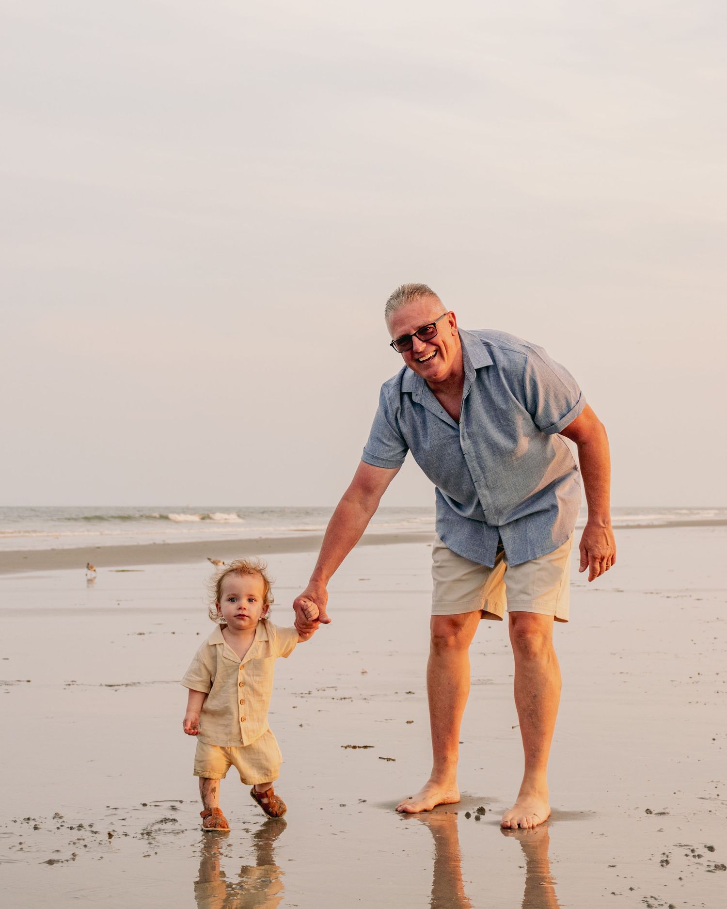 Beach family session in south jersey, grandfather and grandson.