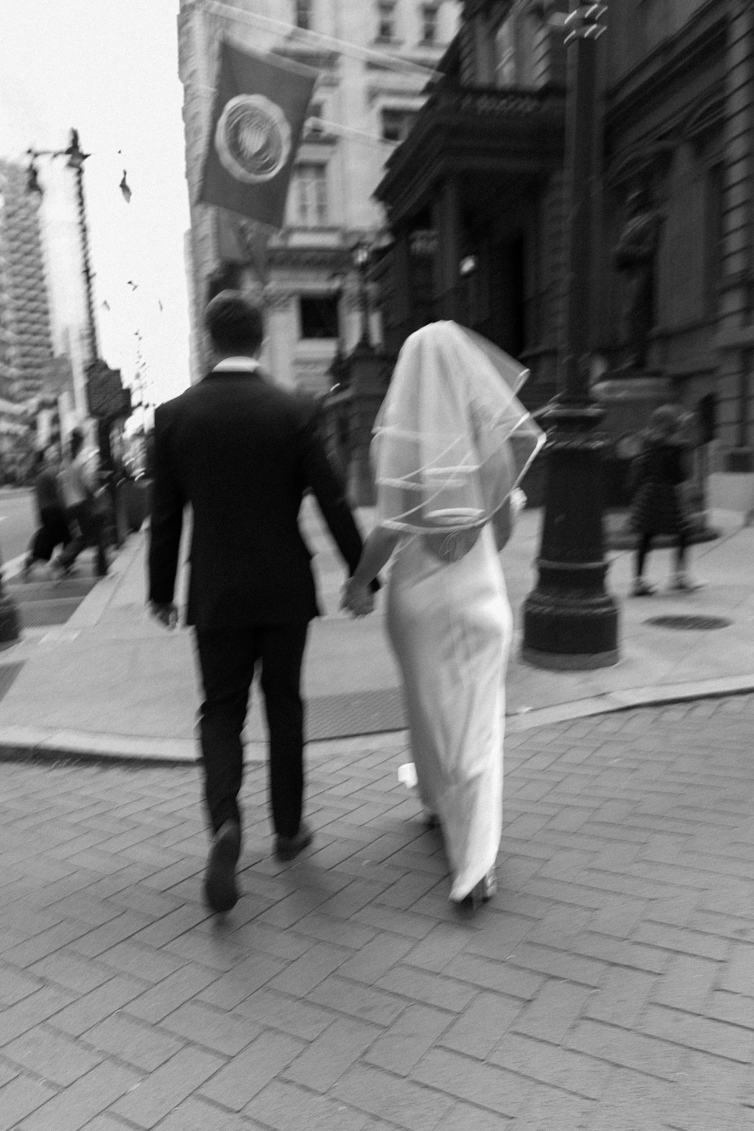 Bride and groom candid moment wedding day Philadelphia city hall photography.