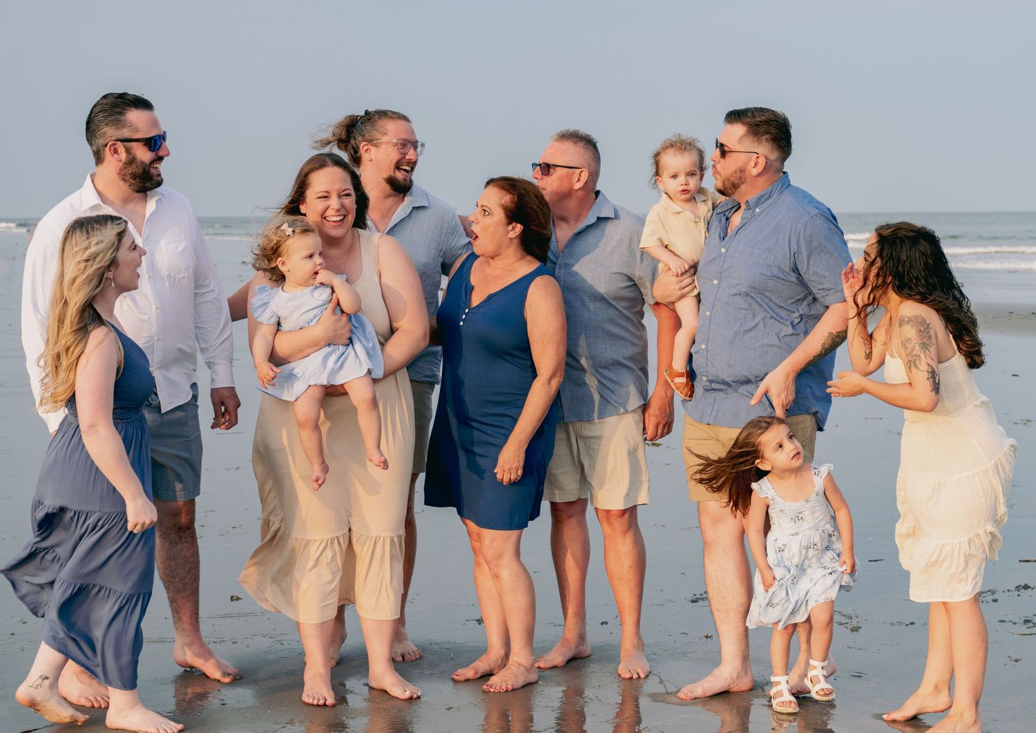 Family session surprise pregnancy announcement on beach in south jersey.