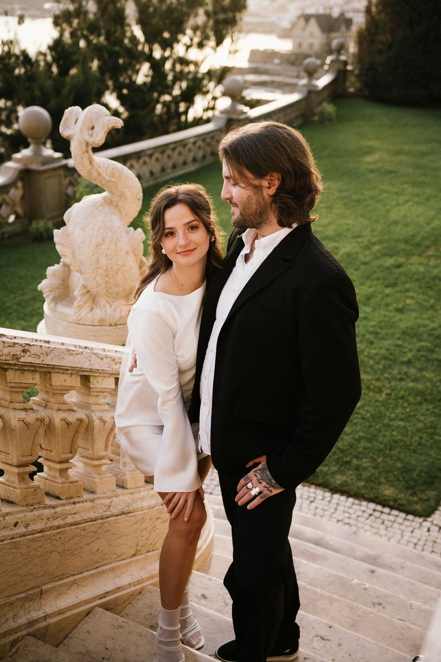 Couple on ornate staircase at Estoril Vintage Hotel, elopement photography