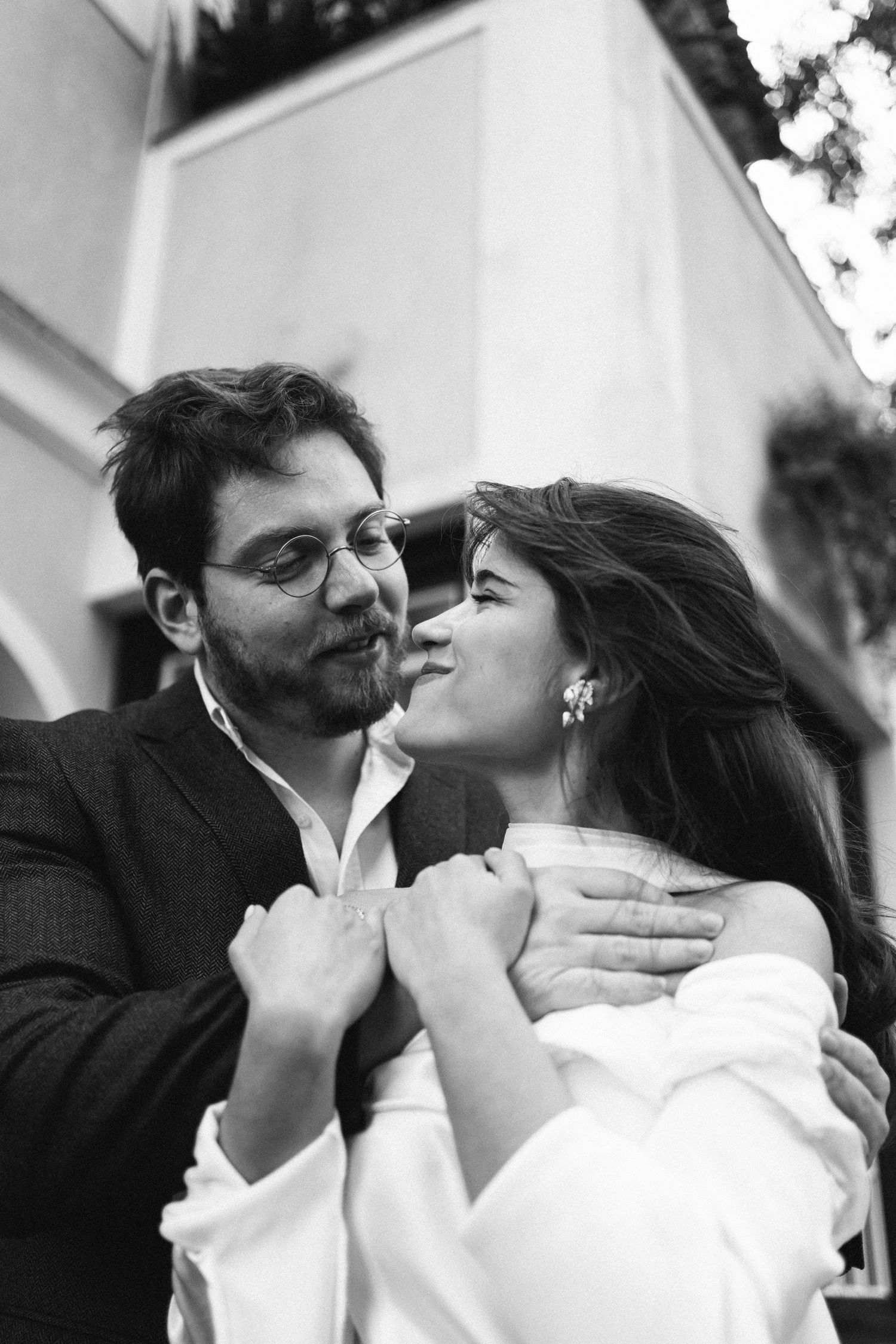 A couple sharing a tender moment during their intimate elopement at Lawrence's Hotel in Sintra, Portugal