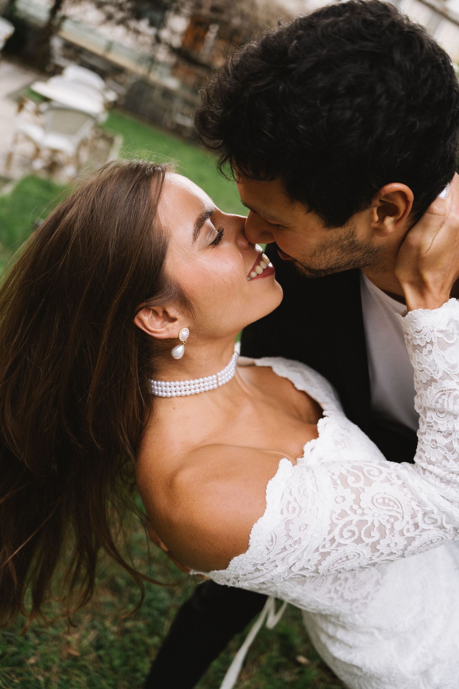 A couple sharing an intimate moment outdoors during their elopement in Portugal
