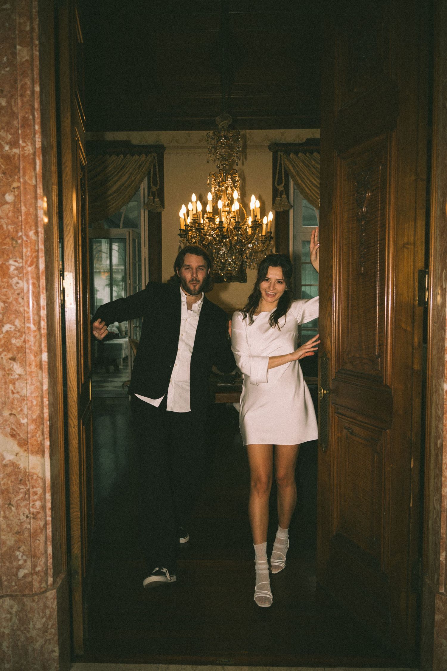 Couple dancing in vintage hotel lobby during elopement, documentary wedding photography Lisbon Portugal