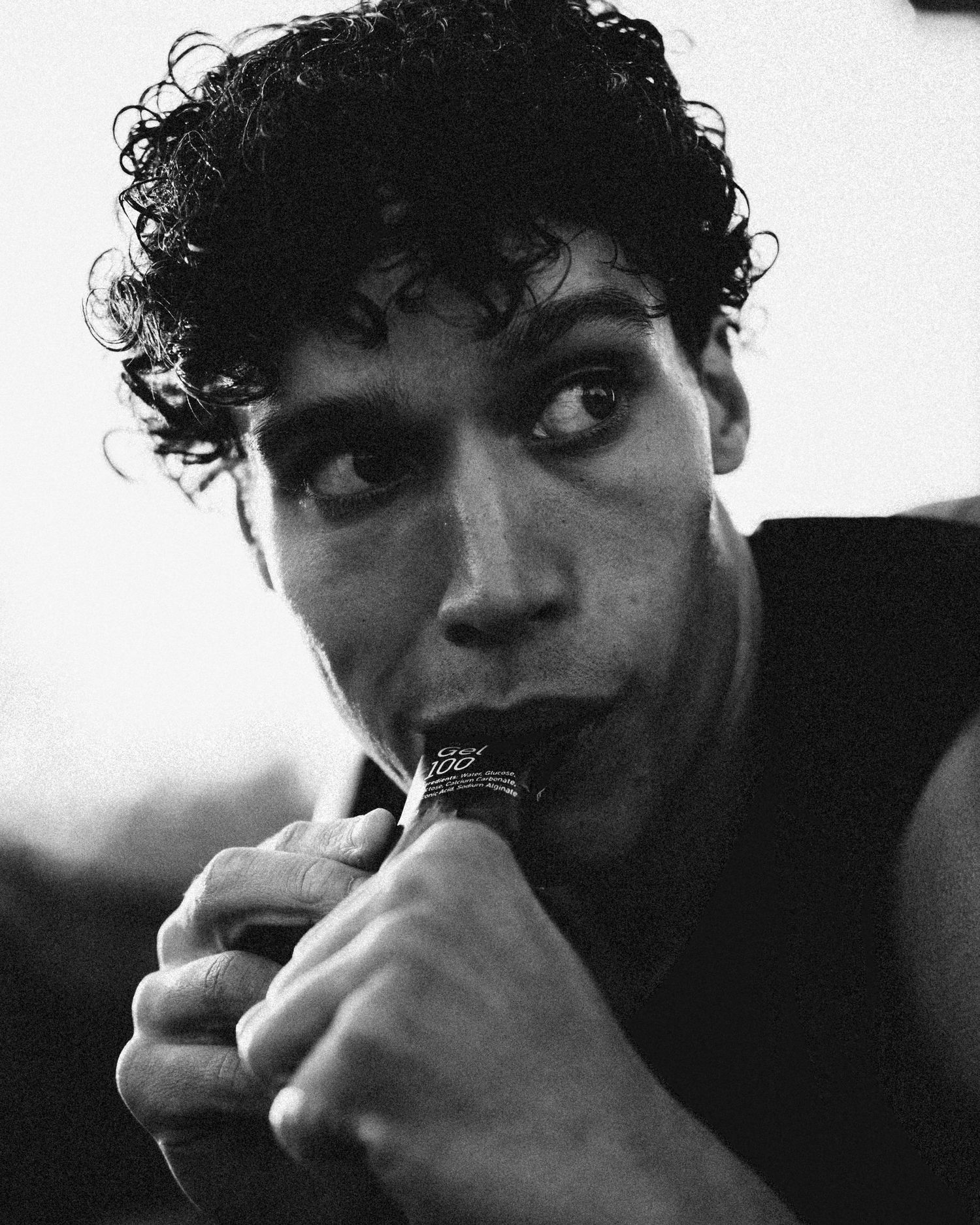 Dramatic black and white portrait series with intense shadows and lighting.