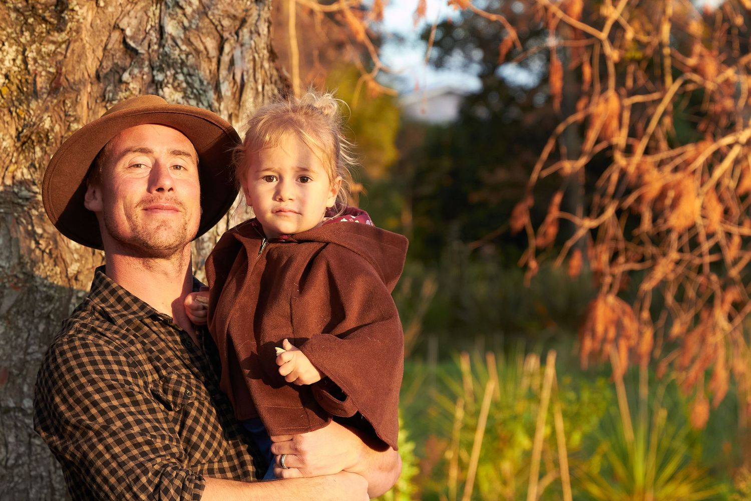 Candid outdoor family portrait session at sunset in New Zealand