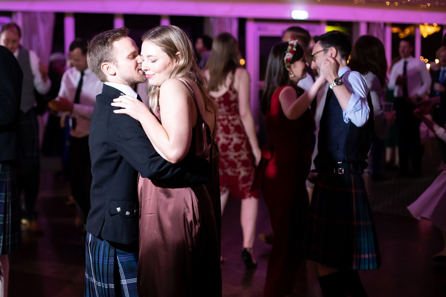Fun and energetic wedding reception dance floor photography New Zealand