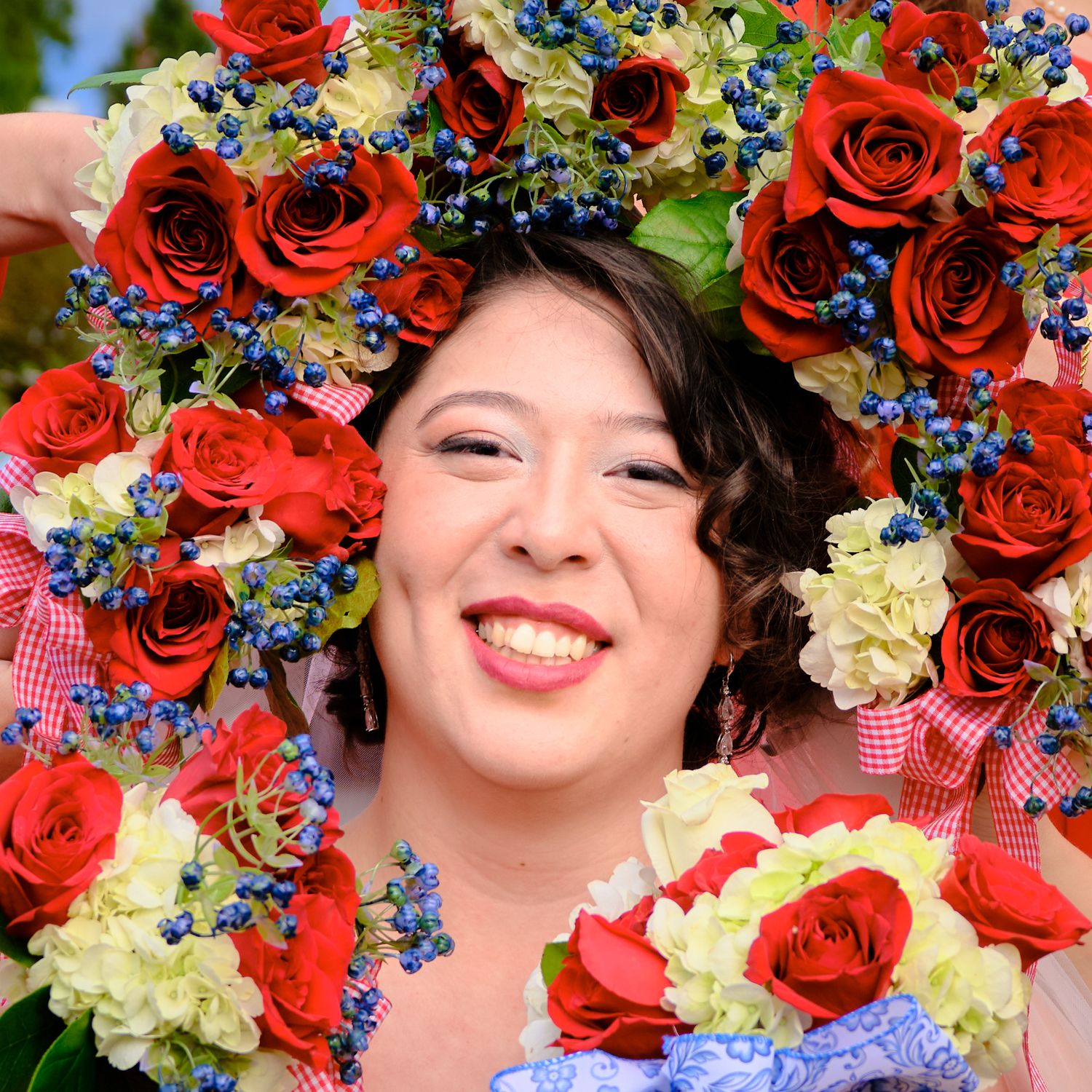 N&D Wedding Photography and Film, an image of a bride surrounded by flowers. Seattle, WA 2026