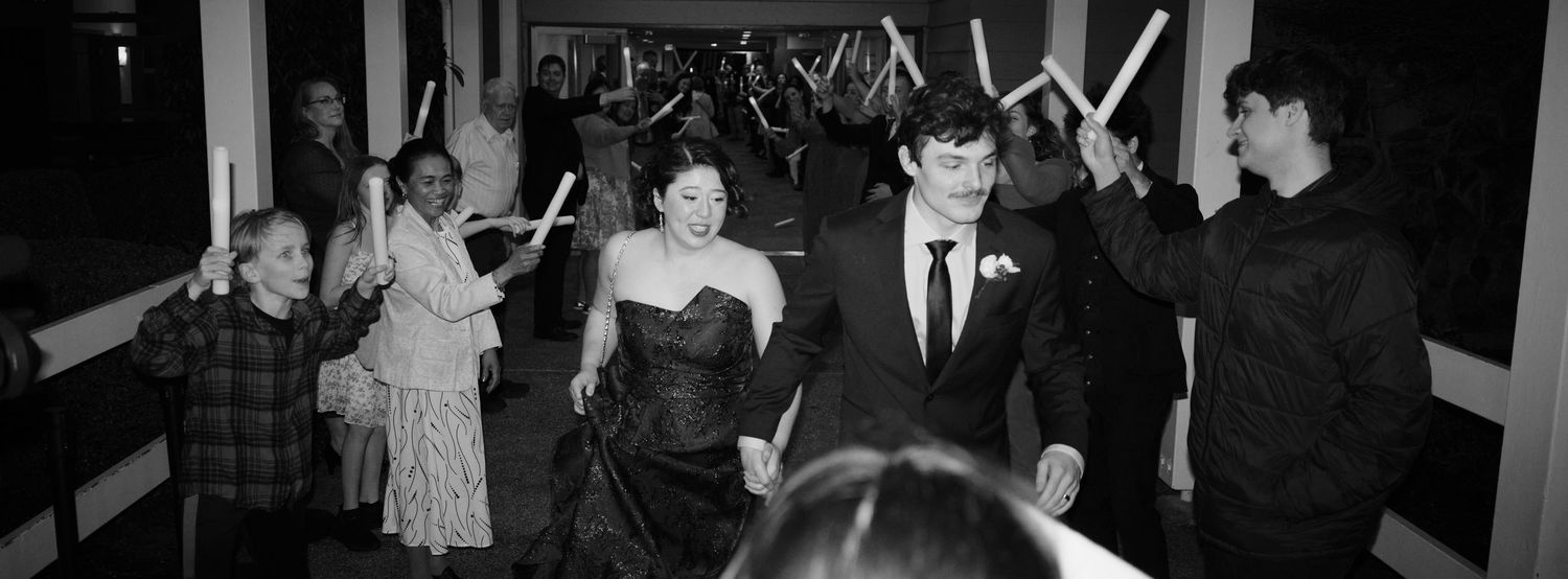 N&D Wedding Photography and Film
This is a candid photo of a bride and groom traveling through a glow tube tunnel in Bothell, WA.