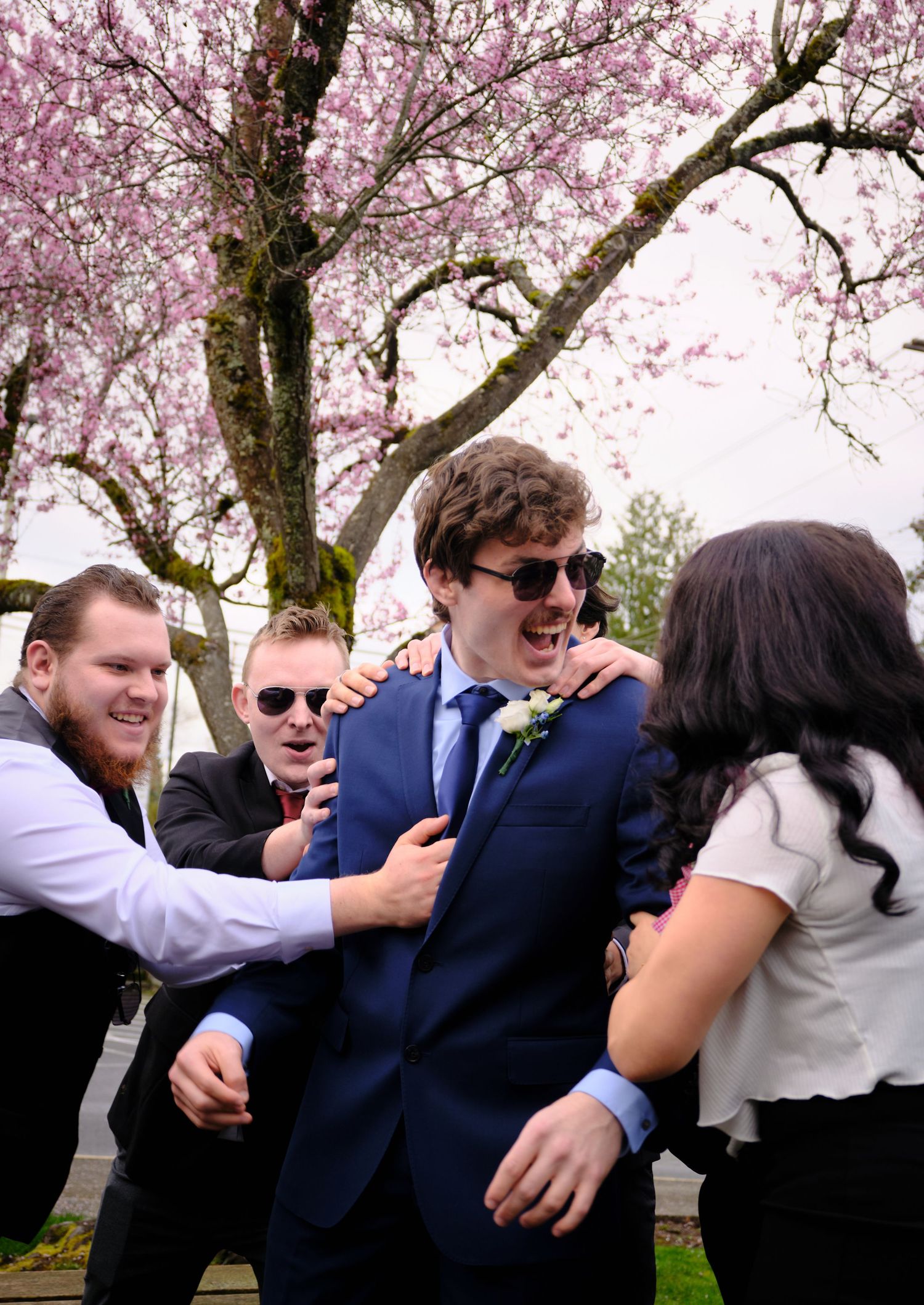 N&D Wedding Photography and Film
A candid photo of a groom getting affectionally jostled around taken in Bothell Washington.