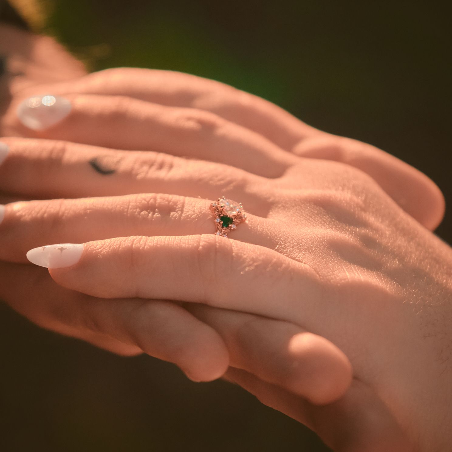 A closeup photo of a newly engaged woman's ring. Tulalip Washington. Photo by N&D Wedding Photography and Film