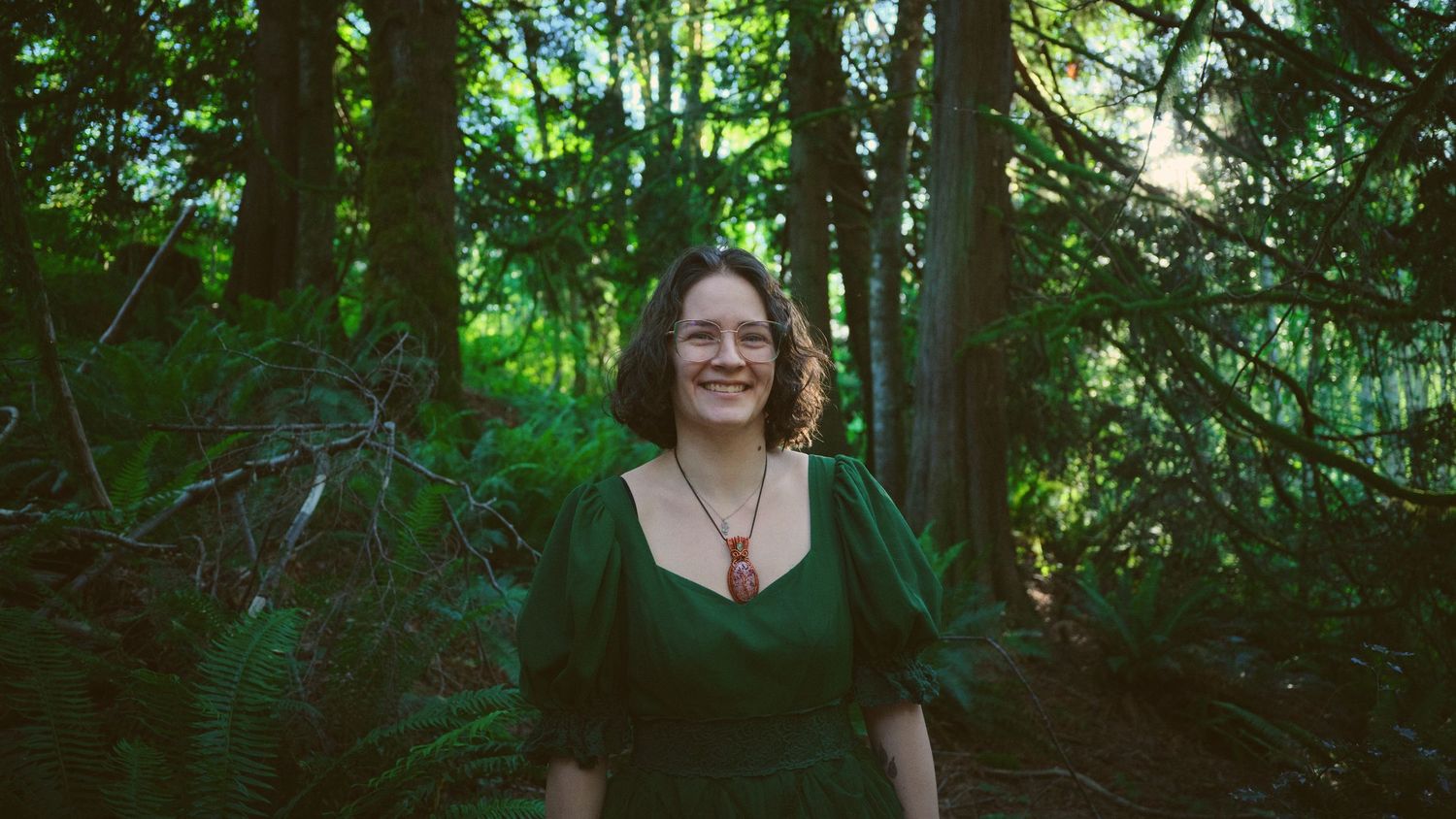 A photo of Foggé Crystal Company owner Miranda in a Snohomish County, Washington State forest. Photo by N&D Wedding Photography and Film