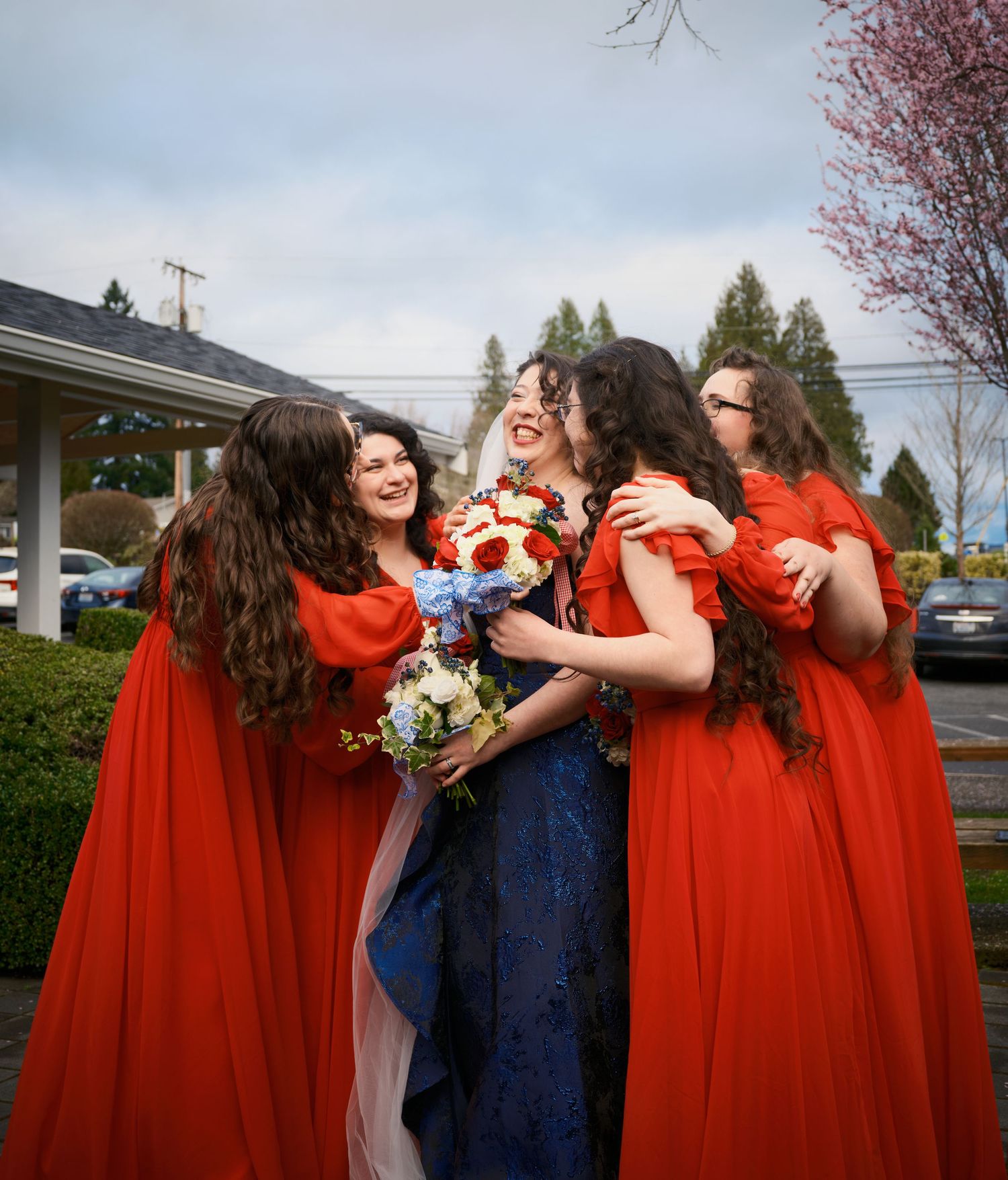 N&D Wedding Photography and Film
A joyful bride getting surprised hugged by her bridesmaids, taken in Bothell Washington