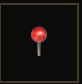 A shiny red lollipop candy on a stick against a dark background.