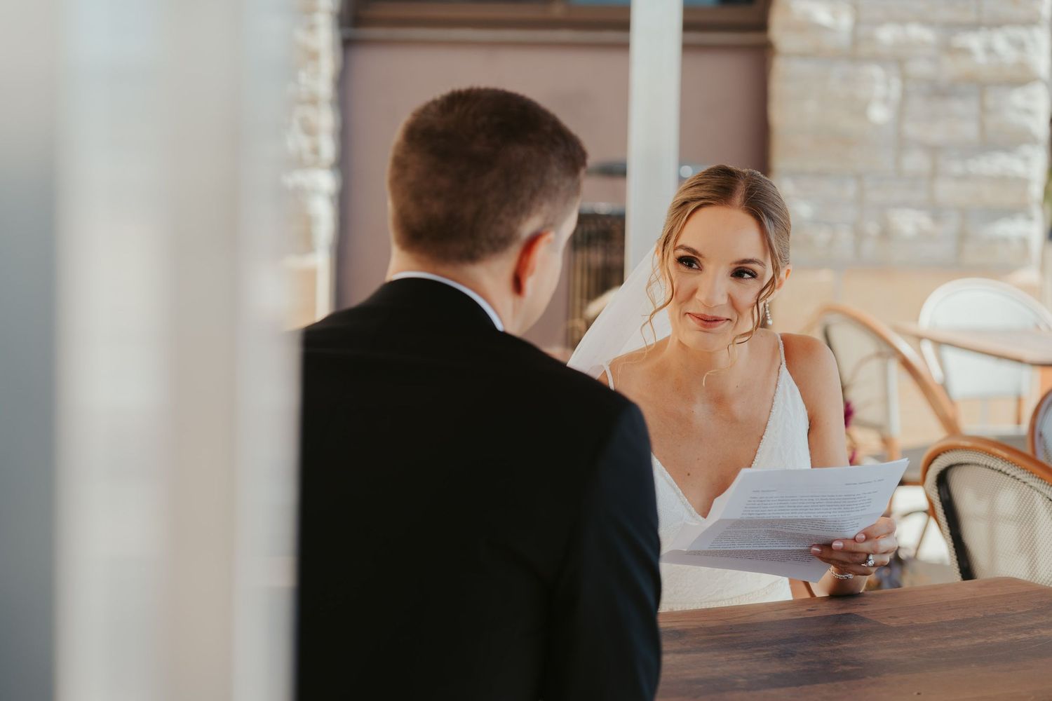 Bride and groom exchange private vows.