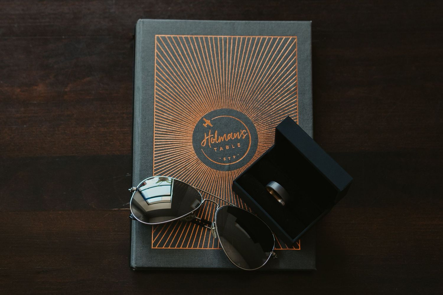 Flat lay of groom's details.