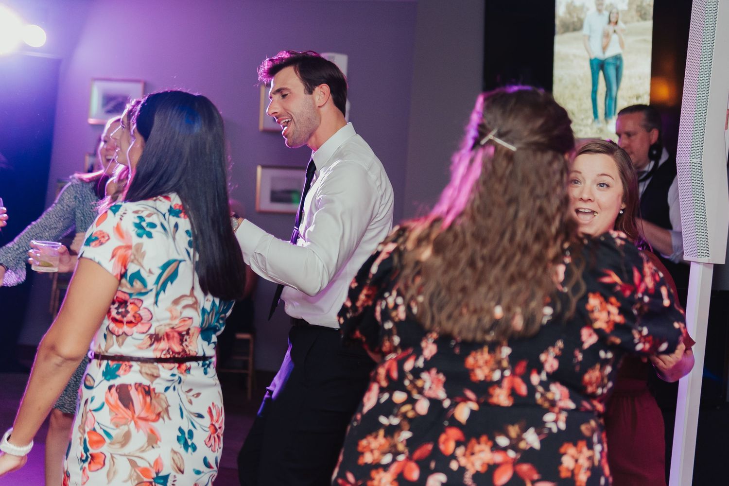 Wedding guests dancing.