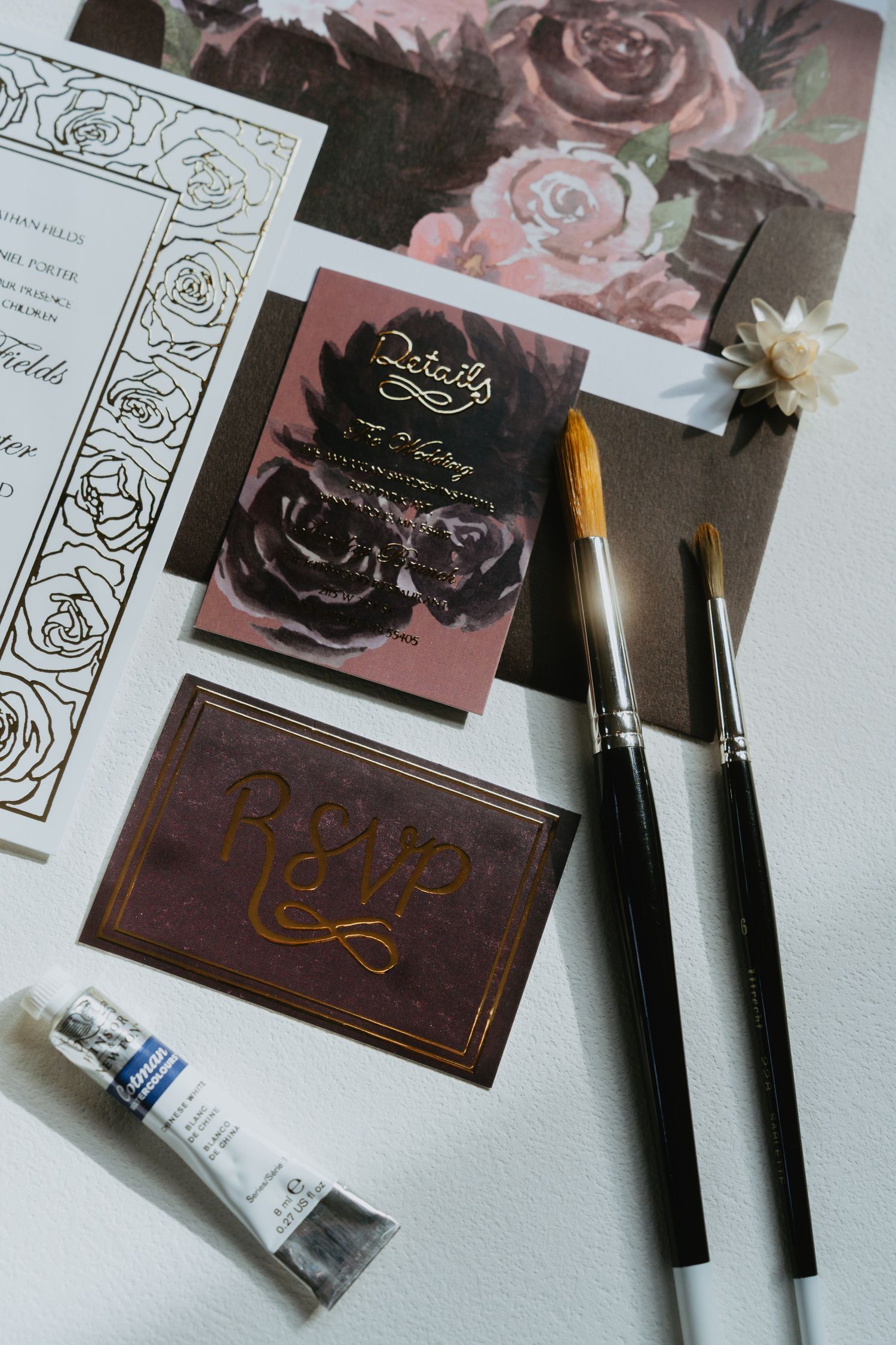 Flat lay of wedding stationery
