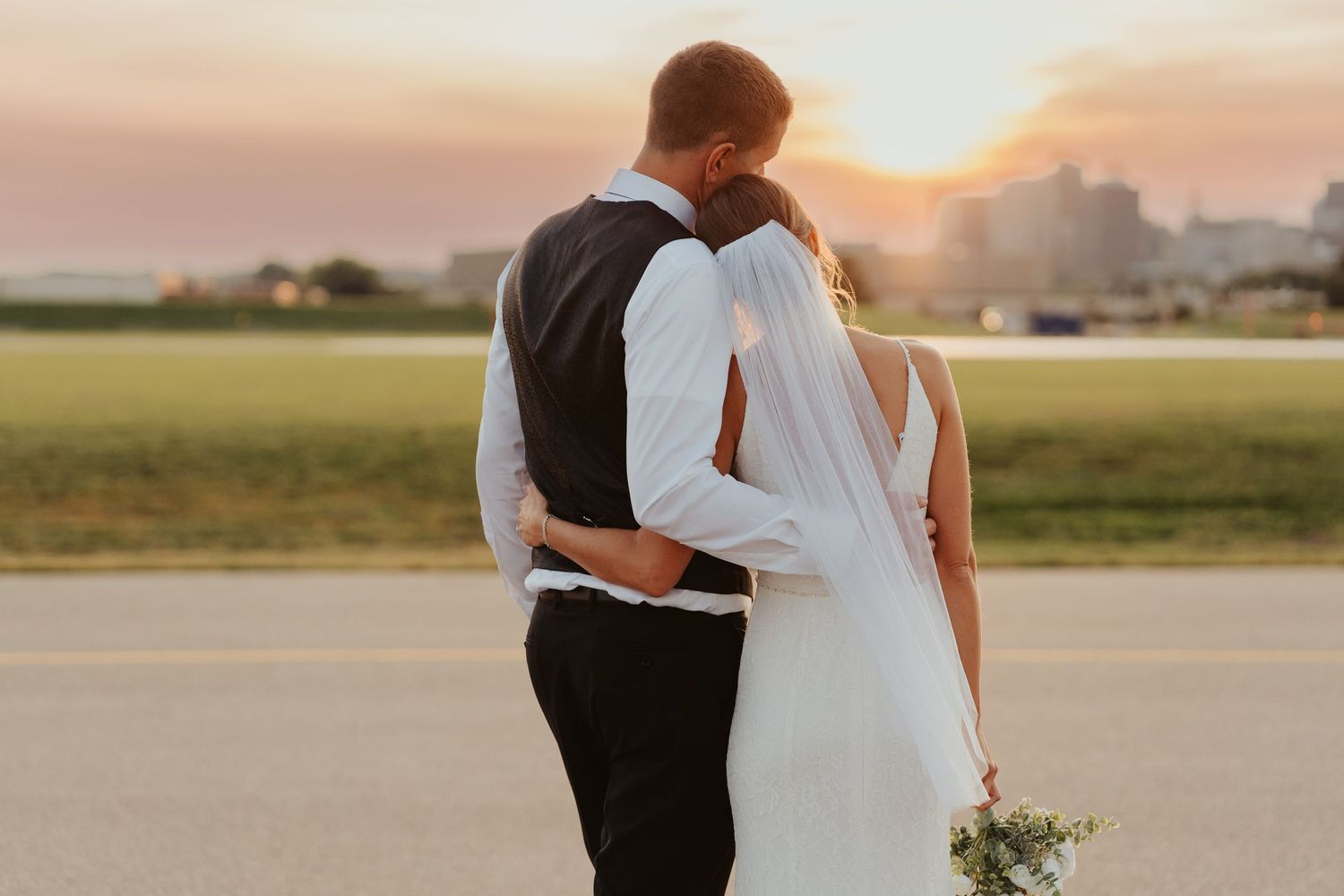 Golden hour portrait of wedding couple.