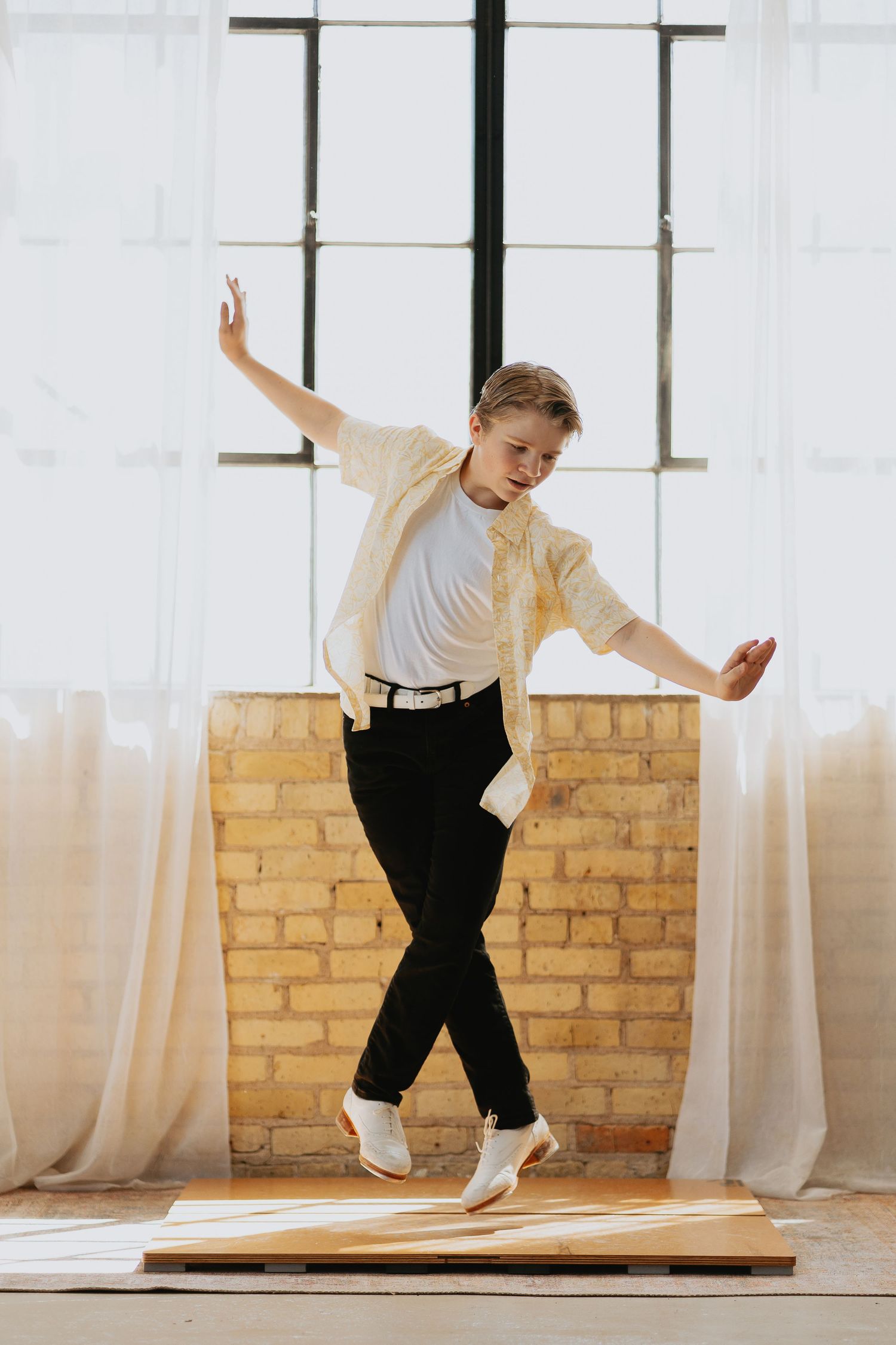 Boy tap dancing