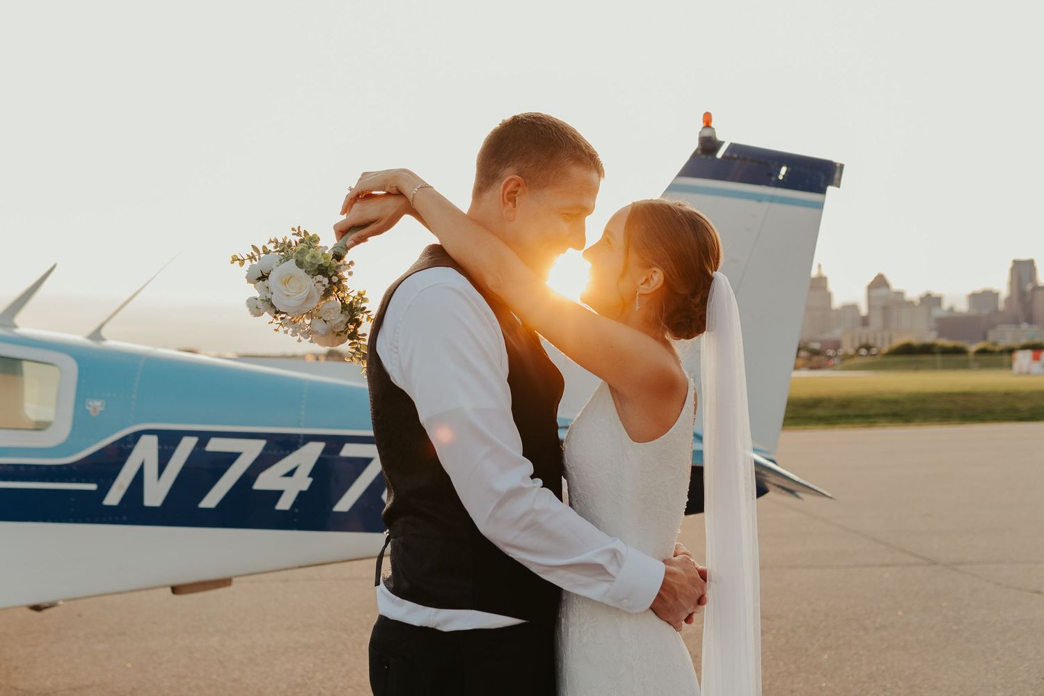 Golden hour portrait of wedding couple.