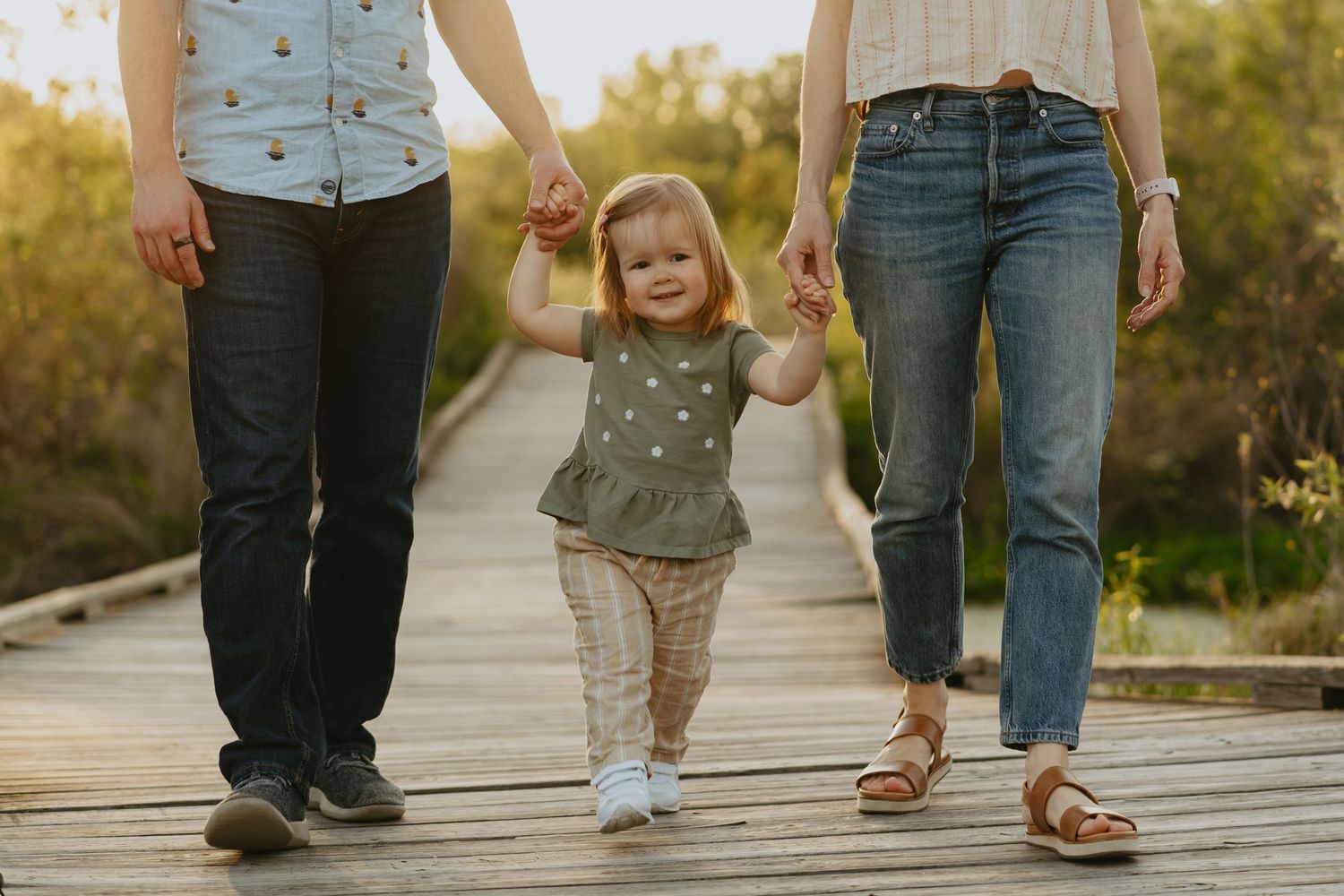 Family walking holding hands
