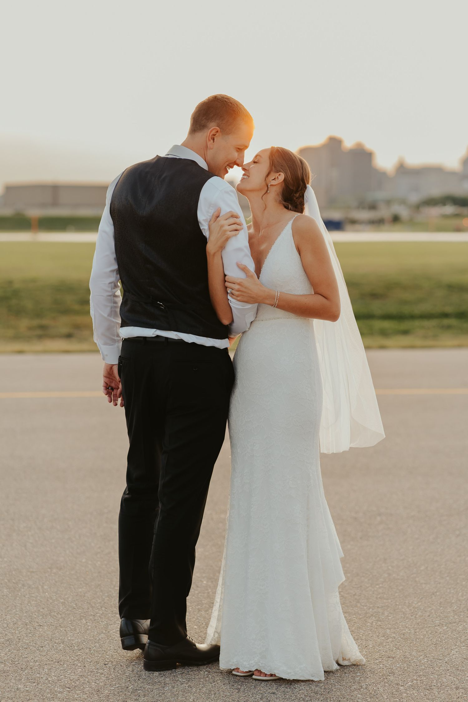 Golden hour portrait of wedding couple.