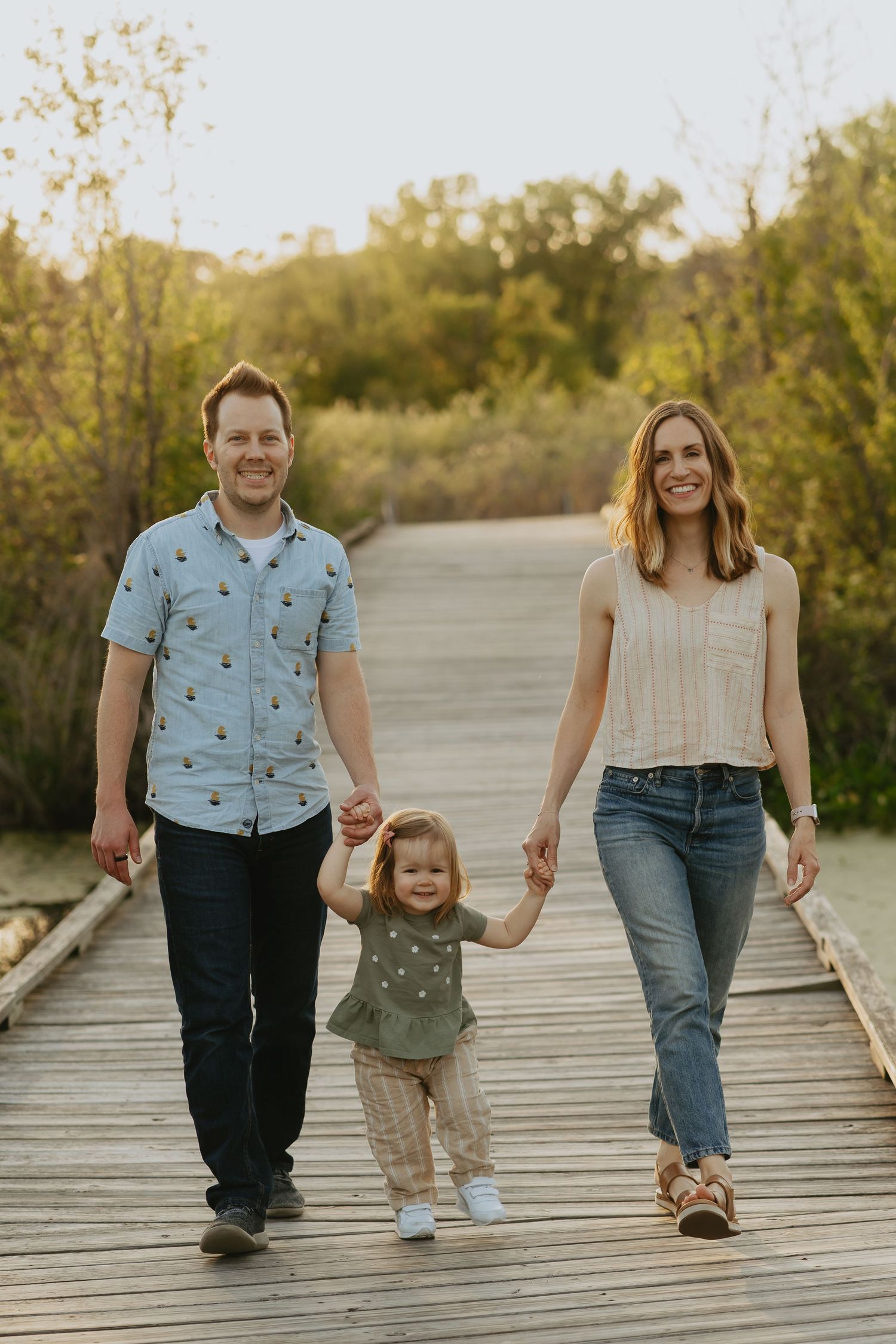Family walking together holding hands