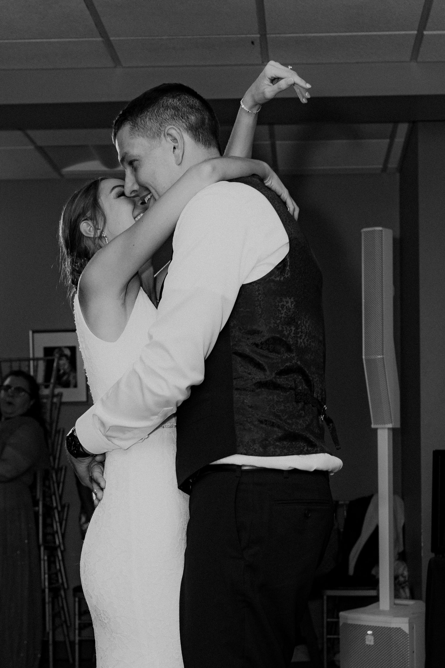 Bride and groom share an intimate moment during their first dance.