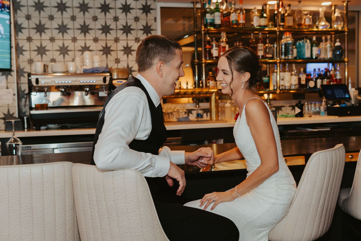Bride and groom at the bar.