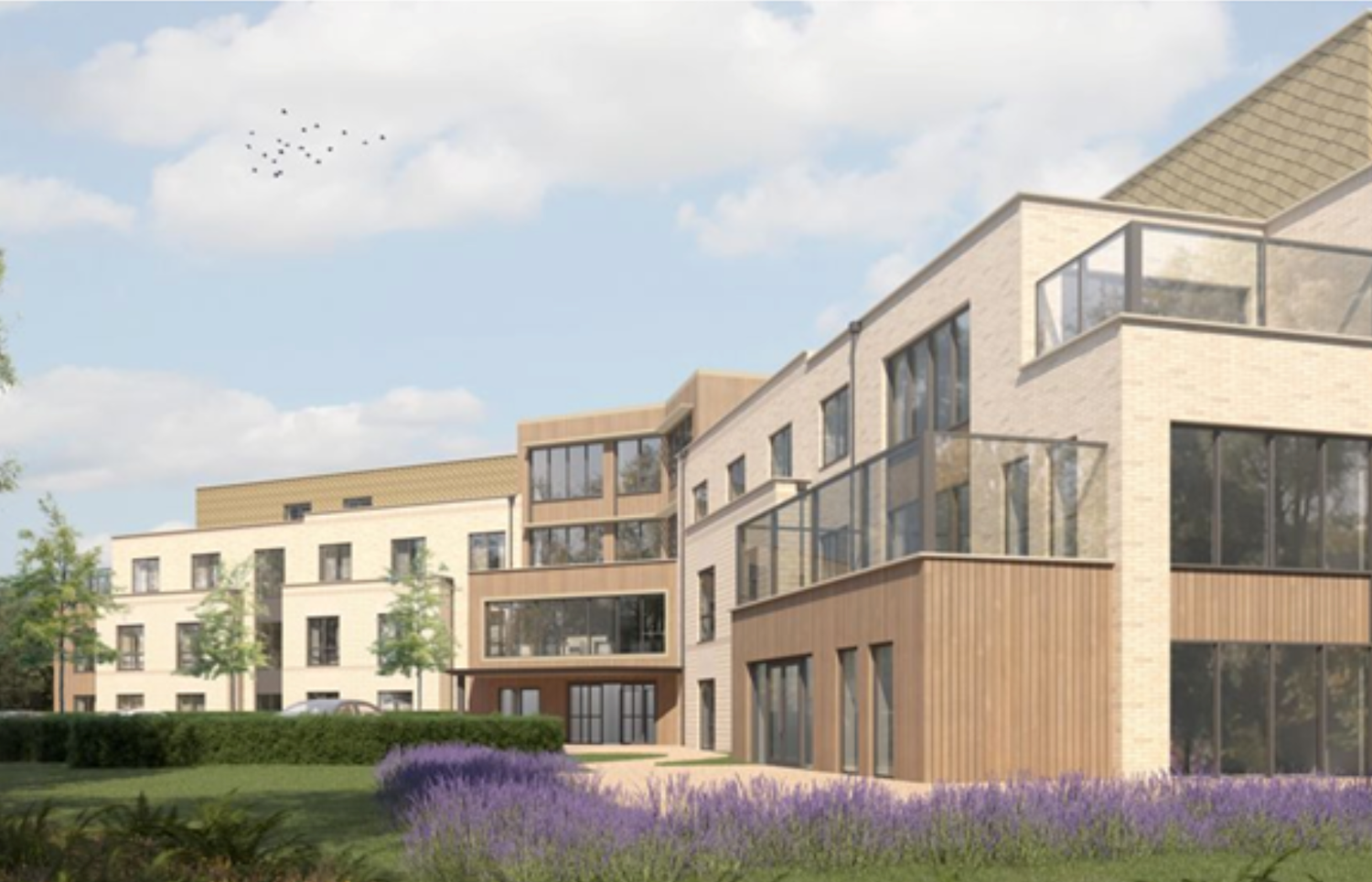 Modern residential apartment complex with wooden cladding, balconies, and landscaped gardens under a blue sky.
