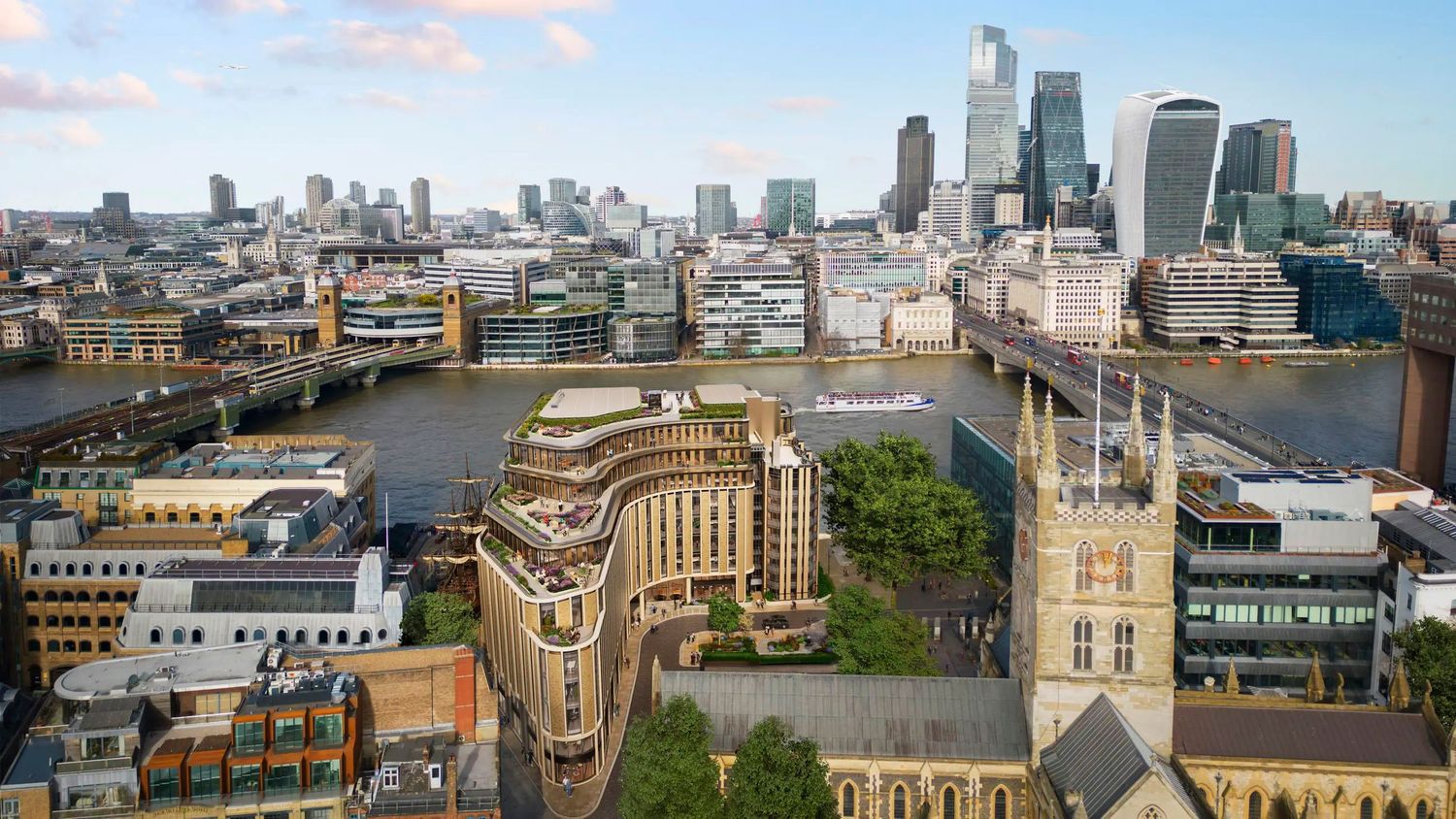 Aerial view of London cityscape showing the Thames River, historic bridges, and modern skyscrapers in the financial district.
