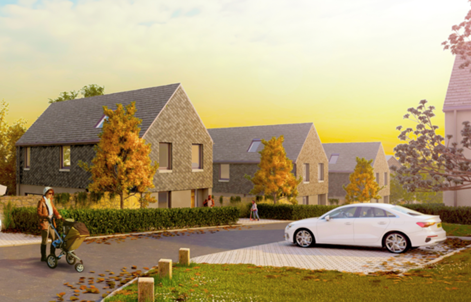 Modern stone residential homes with autumn trees, a white car parked on a paved driveway, and a cyclist nearby at sunset.