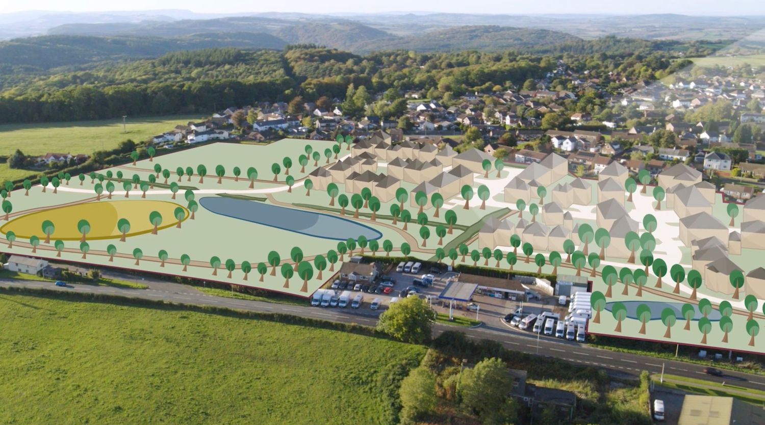 Aerial view of a green urban development plan with trees, paths, and a pond in a village.