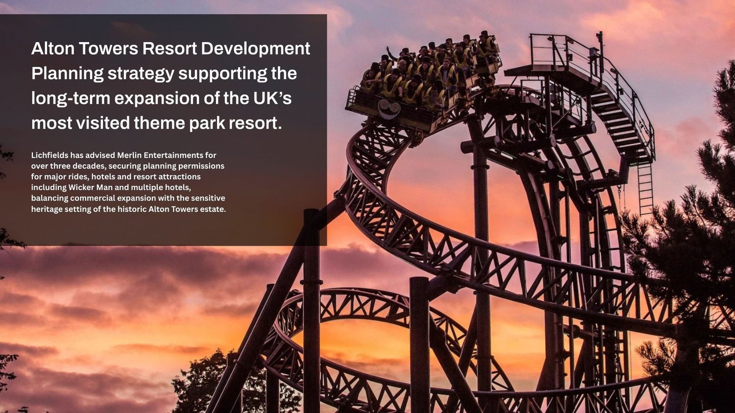 Silhouette of a roller coaster track against a dramatic orange and pink sunset sky at Alton Towers theme park.