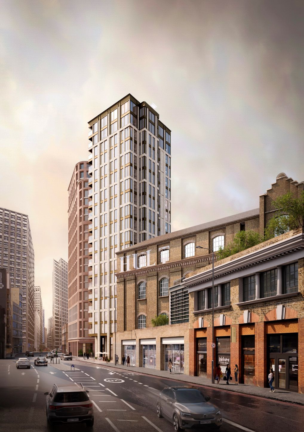 Modern high-rise residential tower with brick facade rising above historic London streetscape on a dramatic cloudy day.