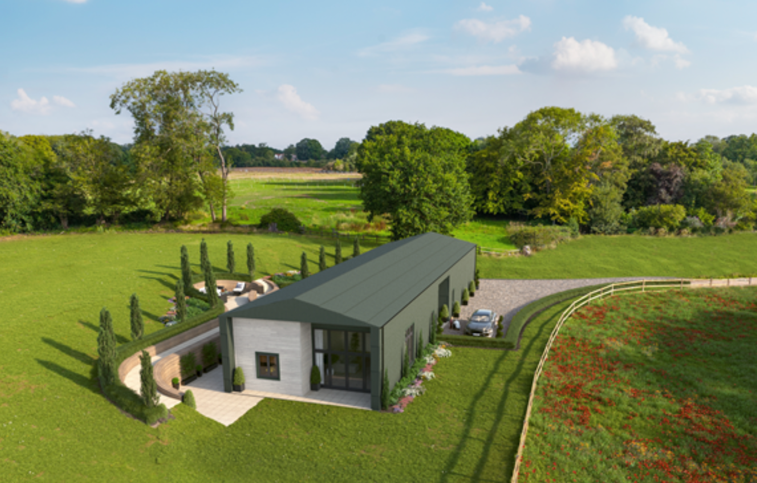 Aerial view of a modern green-roofed bungalow surrounded by lush countryside with cypress trees and rolling lawns.