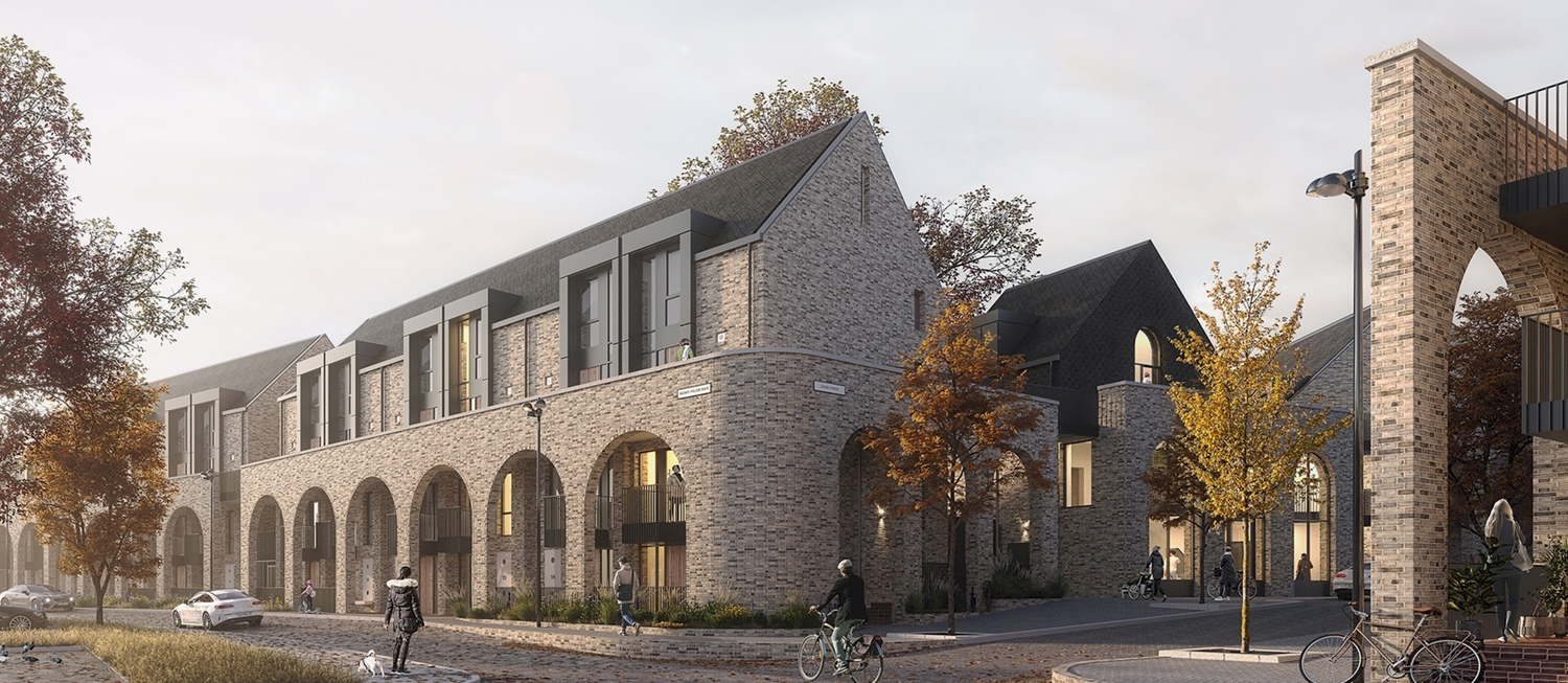 Modern stone building complex with arched walkways and contemporary architecture surrounded by autumn trees.