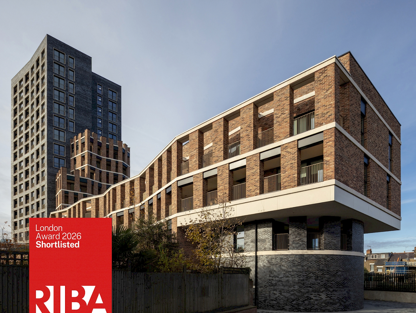 RIBA London Award 2023 Shortlisted modern brick building with curved facade and contemporary architecture.