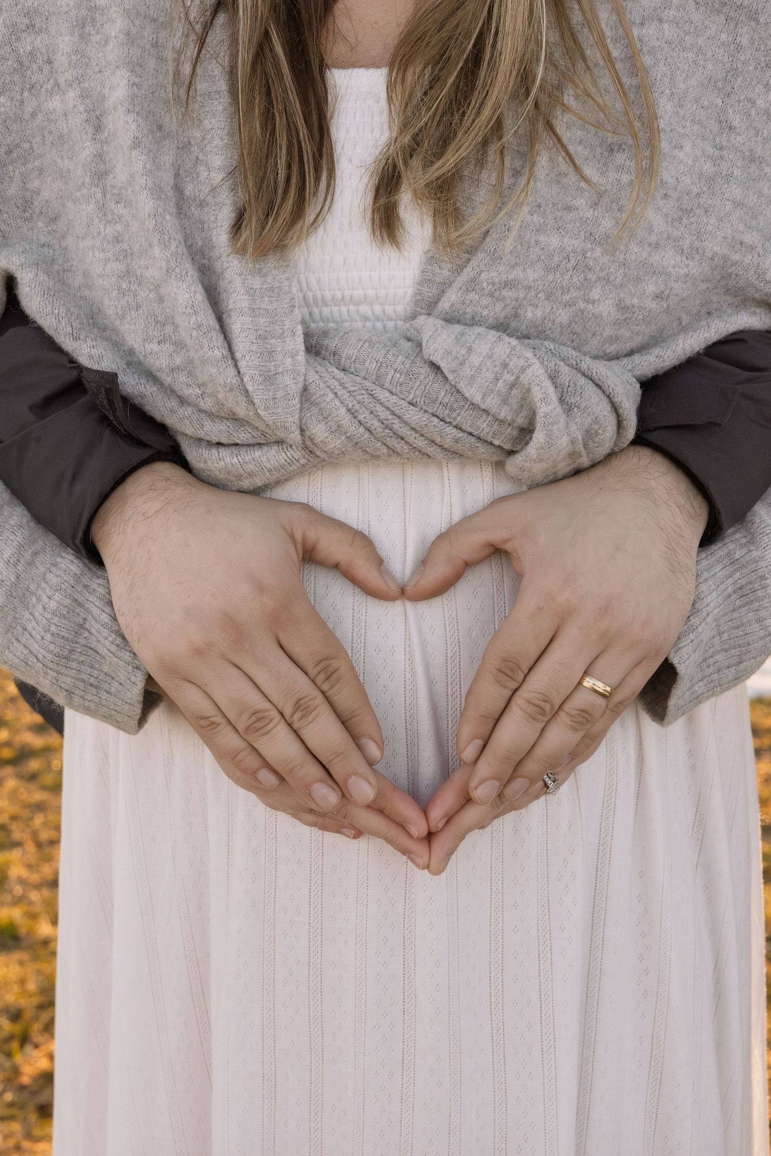 couple making hands into heart