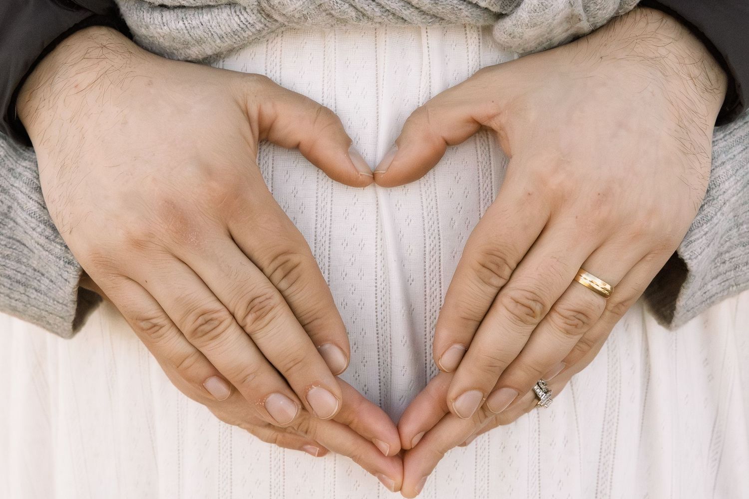 couple making hands into hard in Michigan