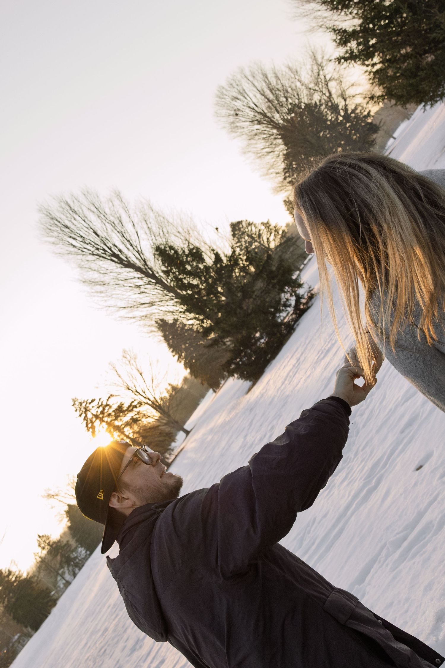 couple dancing outside during golden hour in Michigan