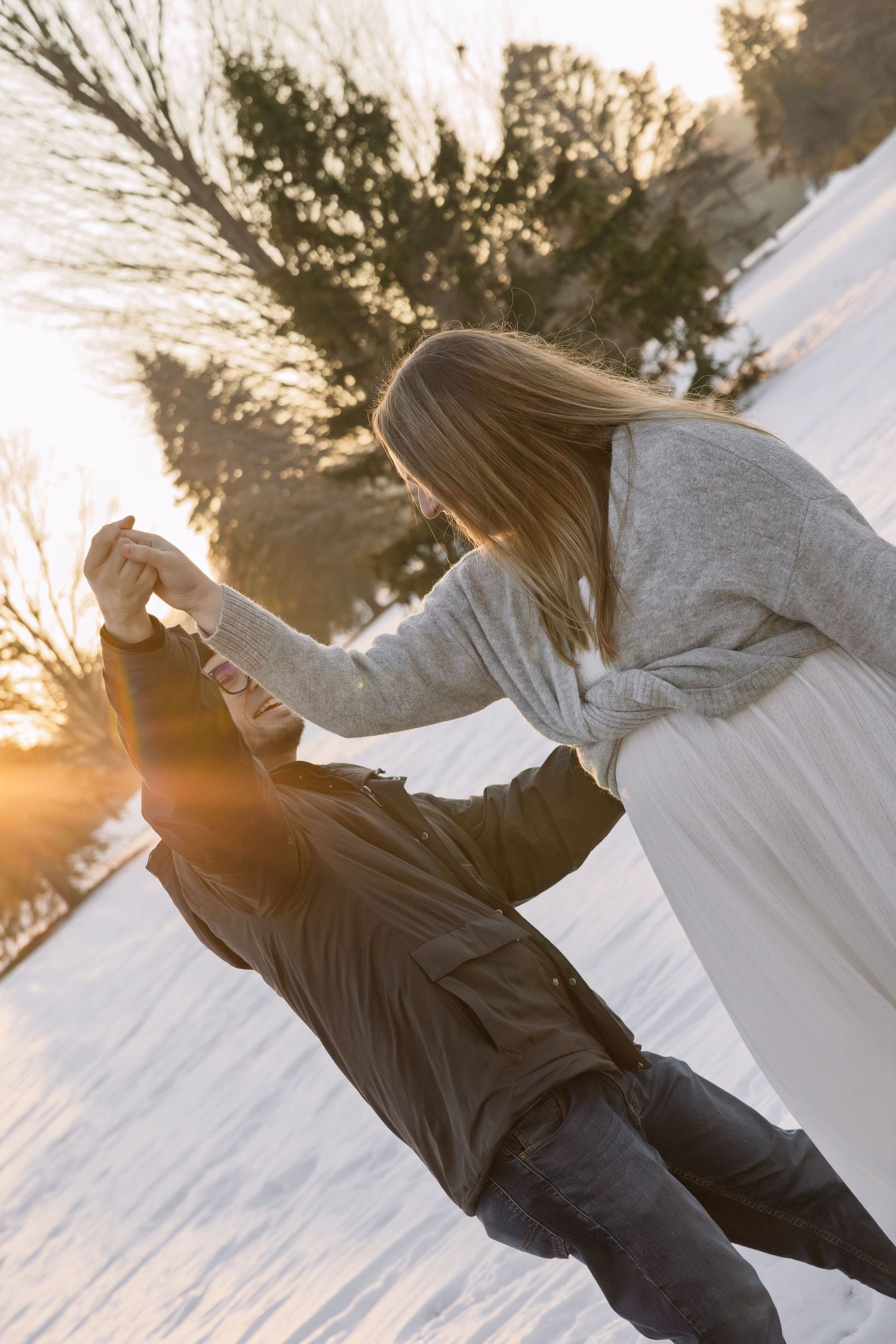 couple dancing outside during golden hour in Michigan