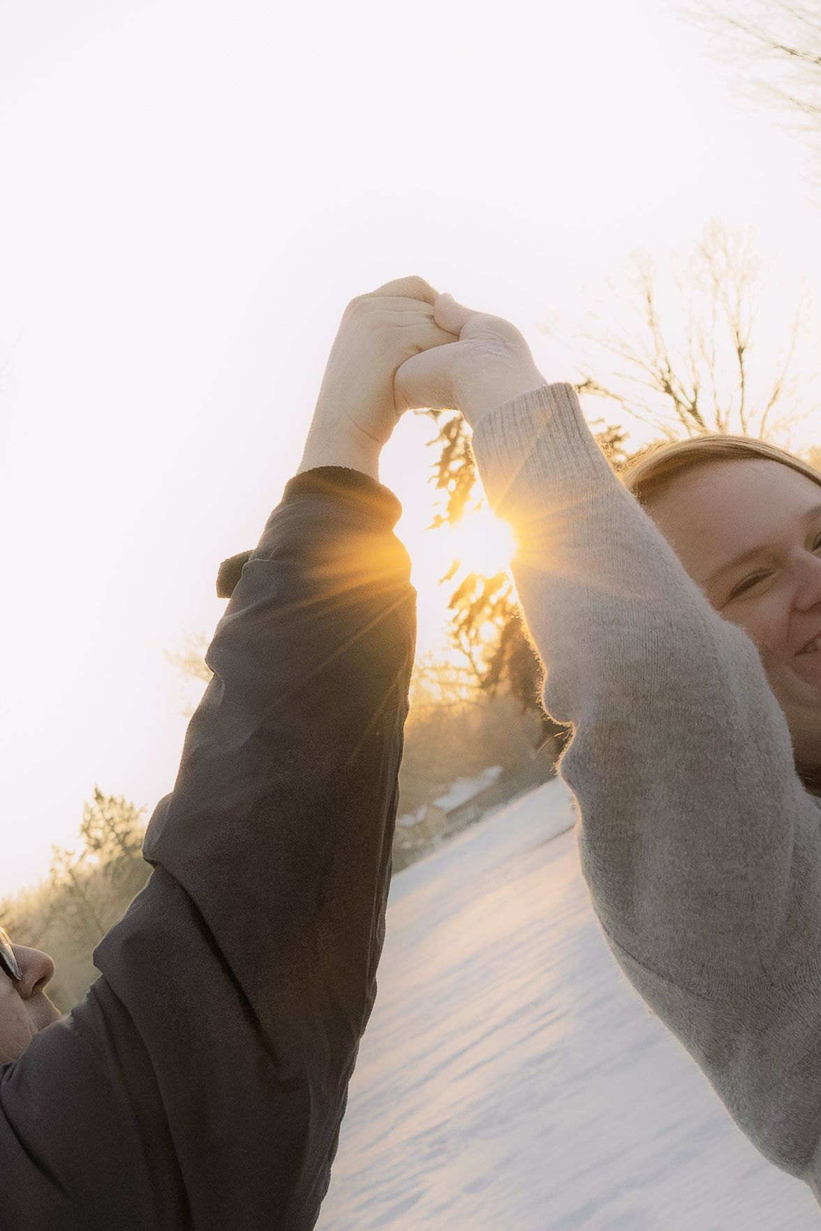 couple dancing outside during golden hour in Michigan
