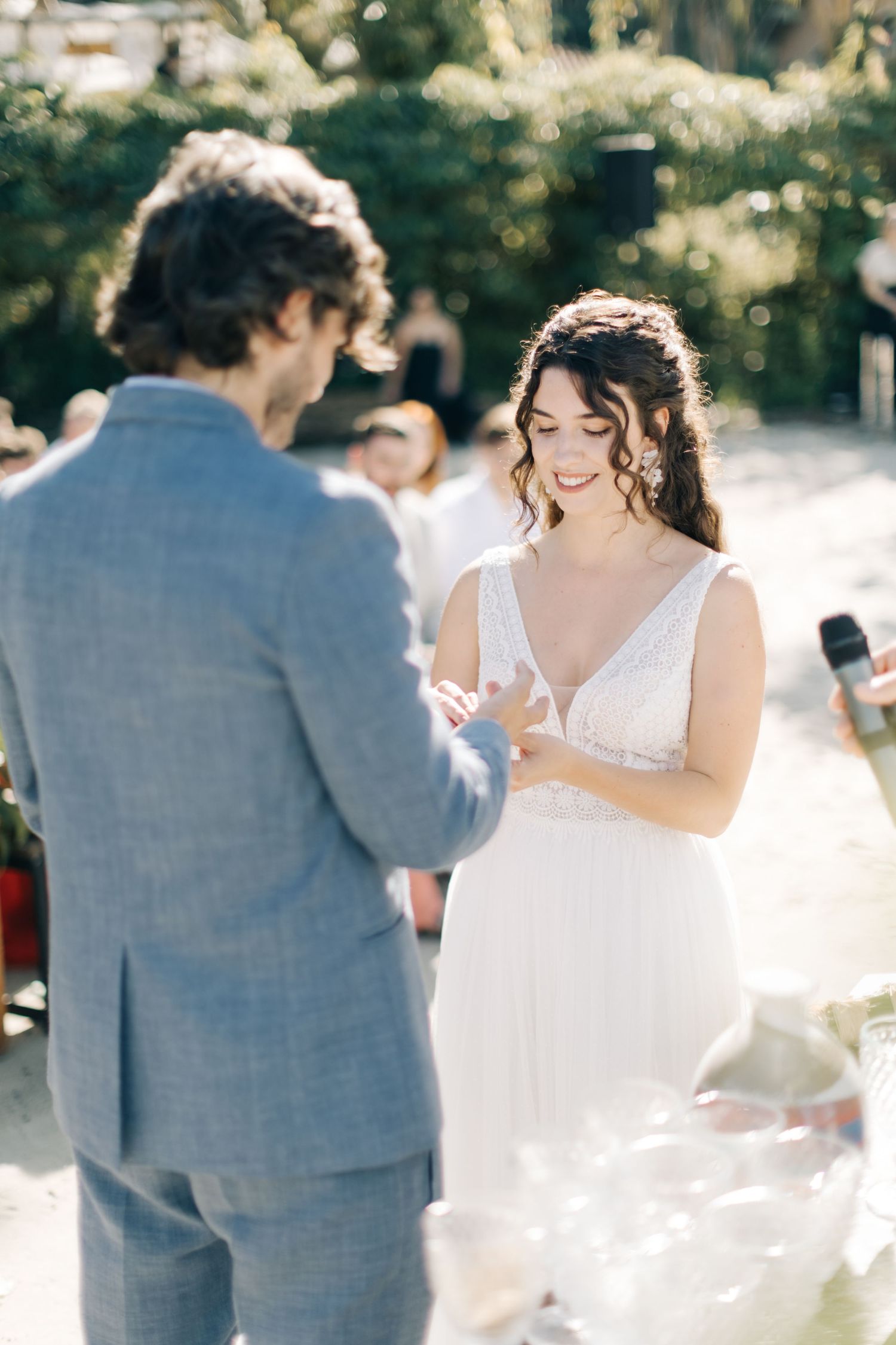 Intimate moment during outdoor wedding vow exchange ceremony.