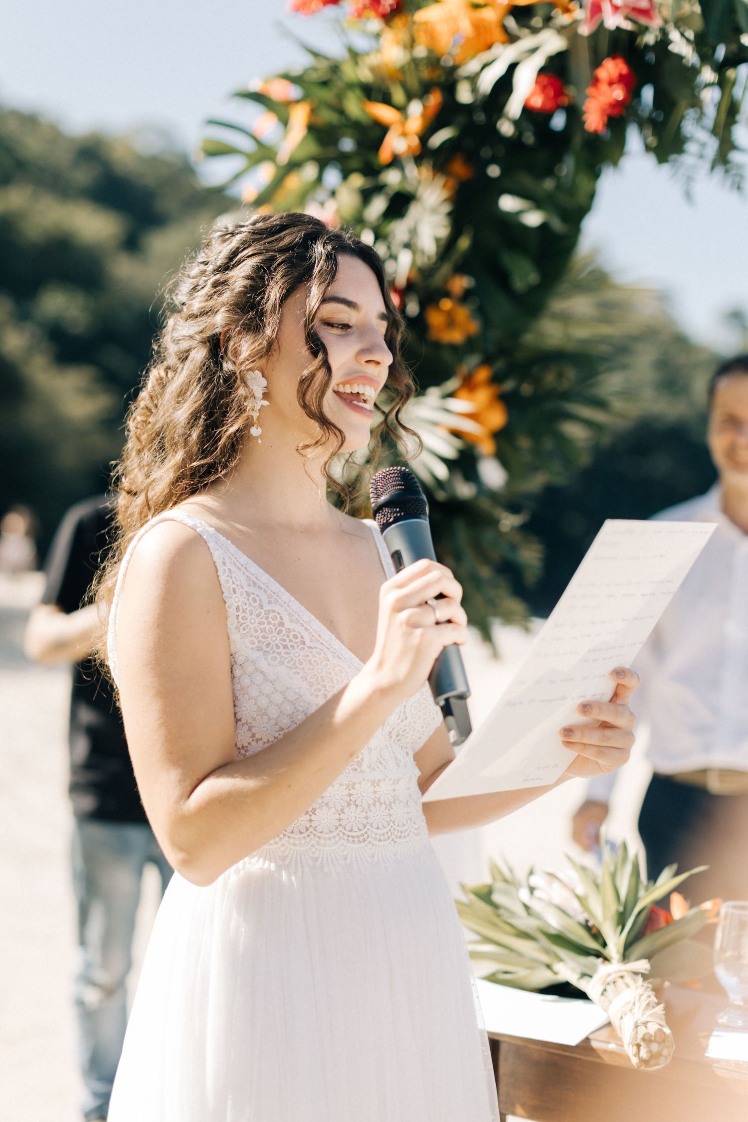 Happy couple shares emotional moments during their outdoor wedding celebration.