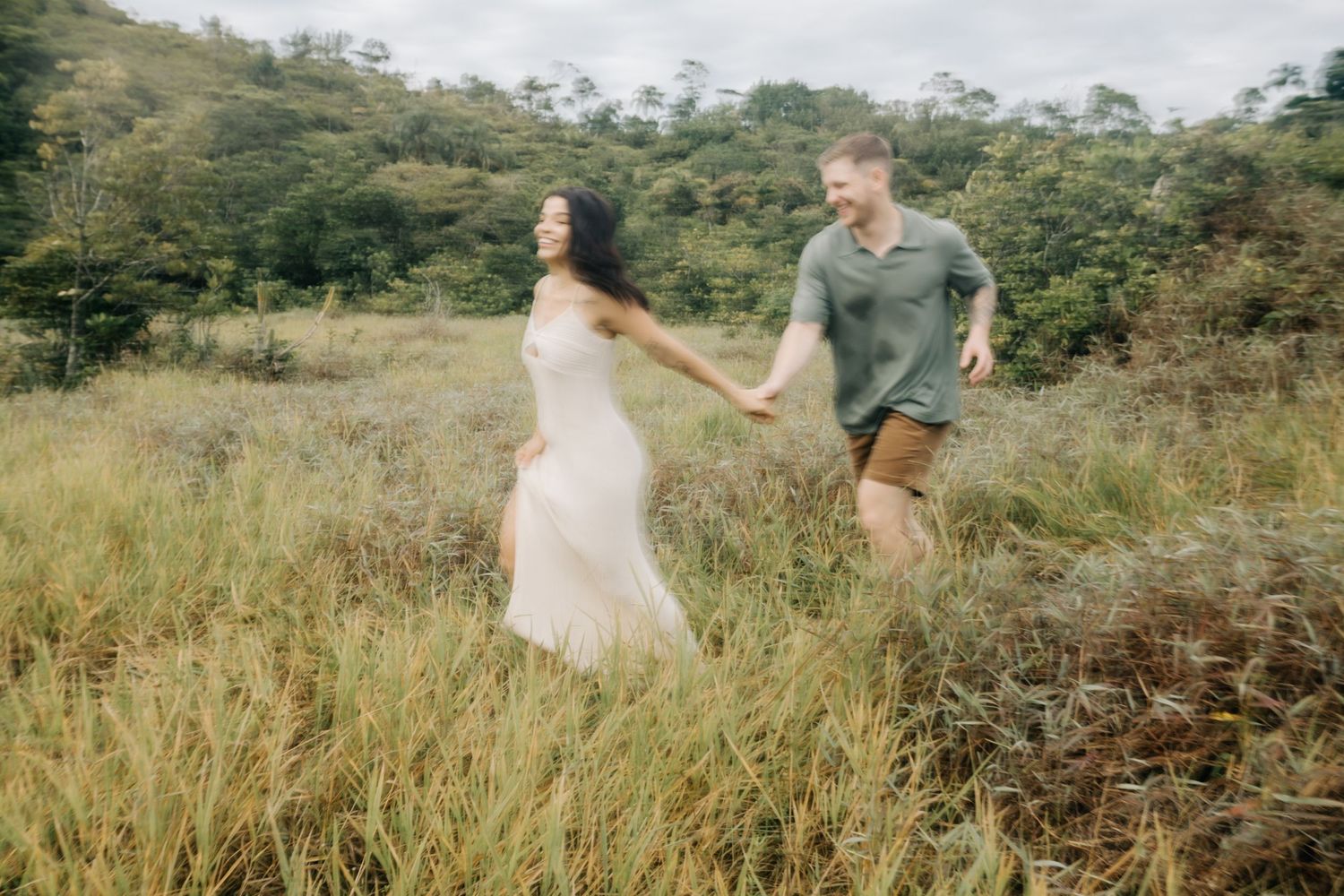A series of candid shots shows a couple's loving interaction in a scenic mountain location.